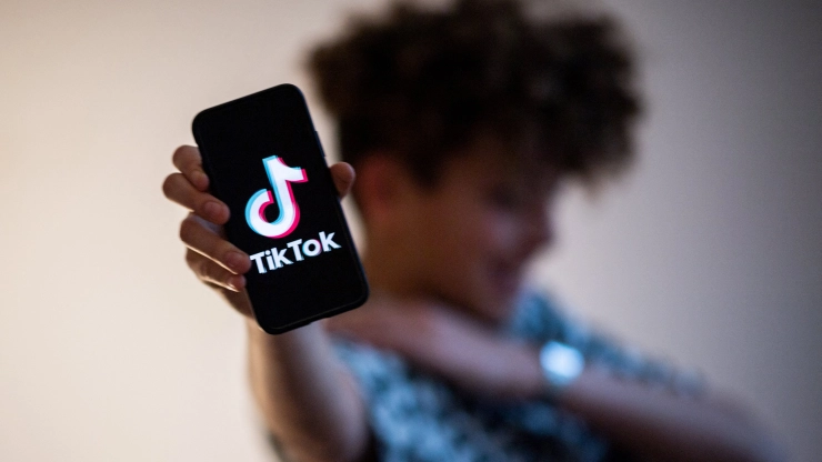 how to repost on tiktok